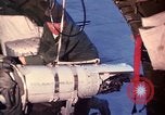 Image of AC 47 crewmen Vietnam Bien Hoa Air Base, 1967, second 31 stock footage video 65675052036