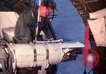 Image of AC 47 crewmen Vietnam Bien Hoa Air Base, 1967, second 32 stock footage video 65675052036