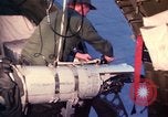 Image of AC 47 crewmen Vietnam Bien Hoa Air Base, 1967, second 36 stock footage video 65675052036