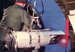 Image of AC 47 crewmen Vietnam Bien Hoa Air Base, 1967, second 37 stock footage video 65675052036
