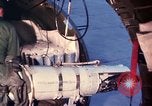 Image of AC 47 crewmen Vietnam Bien Hoa Air Base, 1967, second 39 stock footage video 65675052036