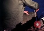 Image of AC 47 crewmen Vietnam Bien Hoa Air Base, 1967, second 42 stock footage video 65675052036