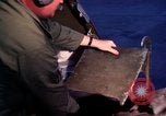 Image of AC 47 crewmen Vietnam Bien Hoa Air Base, 1967, second 44 stock footage video 65675052036