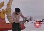 Image of man Antarctica, 1956, second 17 stock footage video 65675052040