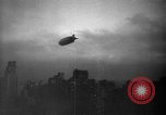 Image of airship LZ 129 Hindenburg New York City USA, 1936, second 25 stock footage video 65675052074