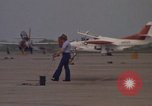 Image of aircraft T-2C Beeville Texas Naval Air Station Chase Field USA, 1982, second 5 stock footage video 65675052113