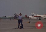 Image of aircraft T-2C Beeville Texas Naval Air Station Chase Field USA, 1982, second 14 stock footage video 65675052113