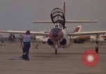 Image of aircraft T-2C Beeville Texas Naval Air Station Chase Field USA, 1982, second 58 stock footage video 65675052113