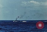 Image of battleships Pacific Ocean, 1945, second 8 stock footage video 65675052148