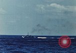 Image of battleships Pacific Ocean, 1945, second 13 stock footage video 65675052148