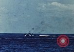 Image of battleships Pacific Ocean, 1945, second 15 stock footage video 65675052148