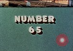 Image of hangar deck of carrier Pacific Ocean, 1945, second 1 stock footage video 65675052156
