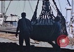 Image of hangar deck of carrier Pacific Ocean, 1945, second 13 stock footage video 65675052156