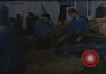 Image of hangar deck of carrier Pacific Ocean, 1945, second 52 stock footage video 65675052156