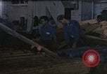 Image of hangar deck of carrier Pacific Ocean, 1945, second 56 stock footage video 65675052156