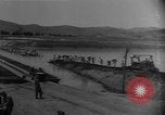 Image of bridge building across Naktong River Korea, 1950, second 19 stock footage video 65675052161