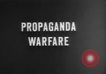 Image of C-47 aircraft dropping propaganda leaflets Korea, 1950, second 1 stock footage video 65675052163