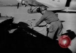Image of C-47 aircraft dropping propaganda leaflets Korea, 1950, second 8 stock footage video 65675052163