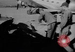 Image of C-47 aircraft dropping propaganda leaflets Korea, 1950, second 12 stock footage video 65675052163