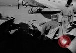Image of C-47 aircraft dropping propaganda leaflets Korea, 1950, second 16 stock footage video 65675052163