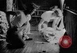 Image of C-47 aircraft dropping propaganda leaflets Korea, 1950, second 30 stock footage video 65675052163