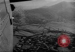 Image of C-47 aircraft dropping propaganda leaflets Korea, 1950, second 37 stock footage video 65675052163