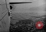 Image of C-47 aircraft dropping propaganda leaflets Korea, 1950, second 40 stock footage video 65675052163