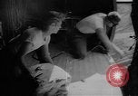 Image of C-47 aircraft dropping propaganda leaflets Korea, 1950, second 41 stock footage video 65675052163