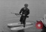 Image of troops walking on water Washington DC USA, 1962, second 12 stock footage video 65675052198