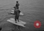 Image of troops walking on water Washington DC USA, 1962, second 14 stock footage video 65675052198