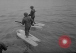 Image of troops walking on water Washington DC USA, 1962, second 16 stock footage video 65675052198