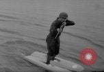 Image of troops walking on water Washington DC USA, 1962, second 25 stock footage video 65675052198