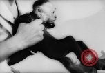 Image of pet monkey Germany, 1962, second 13 stock footage video 65675052199