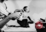 Image of pet monkey Germany, 1962, second 15 stock footage video 65675052199