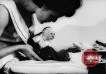 Image of pet monkey Germany, 1962, second 16 stock footage video 65675052199