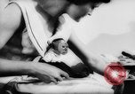 Image of pet monkey Germany, 1962, second 17 stock footage video 65675052199