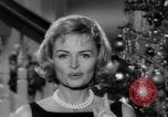 Immagine di Donna Reed e legami di risparmio United States USA, 1961, secondo 20 filmato di repertorio 65675052225