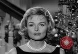 Immagine di Donna Reed e legami di risparmio United States USA, 1961, secondo 22 filmato di repertorio 65675052225