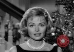 Immagine di Donna Reed e legami di risparmio United States USA, 1961, secondo 23 filmato di repertorio 65675052225