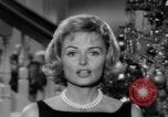 Immagine di Donna Reed e legami di risparmio United States USA, 1961, secondo 25 filmato di repertorio 65675052225