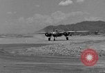 Image of Repair of U.S. C-46 aircraft with help of indigenous people Burma, 1944, second 3 stock footage video 65675052233