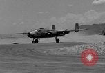 Image of Repair of U.S. C-46 aircraft with help of indigenous people Burma, 1944, second 6 stock footage video 65675052233