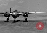 Image of Repair of U.S. C-46 aircraft with help of indigenous people Burma, 1944, second 10 stock footage video 65675052233