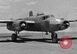 Image of Repair of U.S. C-46 aircraft with help of indigenous people Burma, 1944, second 12 stock footage video 65675052233