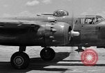Image of Repair of U.S. C-46 aircraft with help of indigenous people Burma, 1944, second 14 stock footage video 65675052233