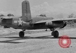 Image of Repair of U.S. C-46 aircraft with help of indigenous people Burma, 1944, second 18 stock footage video 65675052233