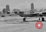Image of Repair of U.S. C-46 aircraft with help of indigenous people Burma, 1944, second 19 stock footage video 65675052233
