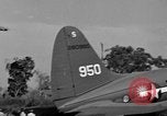 Image of Repair of U.S. C-46 aircraft with help of indigenous people Burma, 1944, second 33 stock footage video 65675052233
