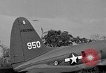 Image of Repair of U.S. C-46 aircraft with help of indigenous people Burma, 1944, second 36 stock footage video 65675052233