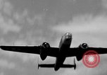 Image of Repair of U.S. C-46 aircraft with help of indigenous people Burma, 1944, second 38 stock footage video 65675052233